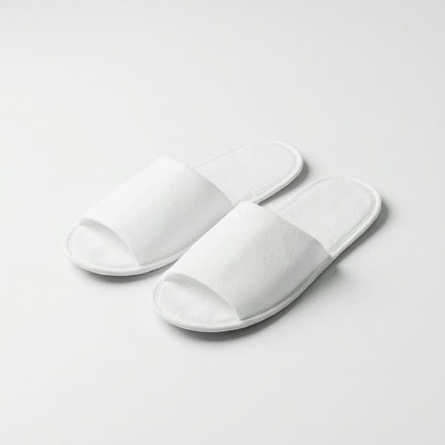 Одноразовые тапочки (оверлок), спанбонд, стелька н/п, мыс открытый